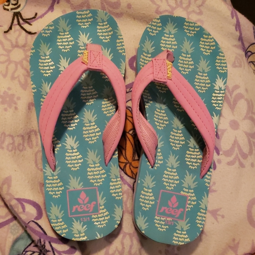 NWOT reef flip flops